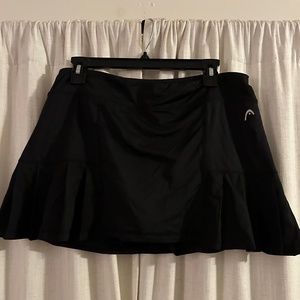 Black pleated tennis skort